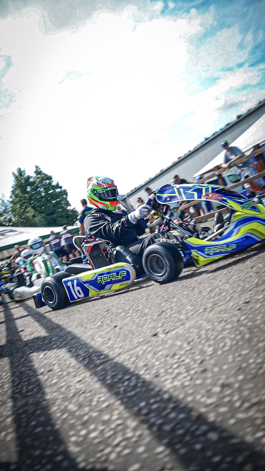 Presley Walker on the kart grid with the Roalf Racing #16 kart